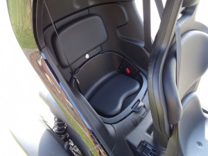 The passenger seat is built into the rear of the car and provides just enough space for an adult
