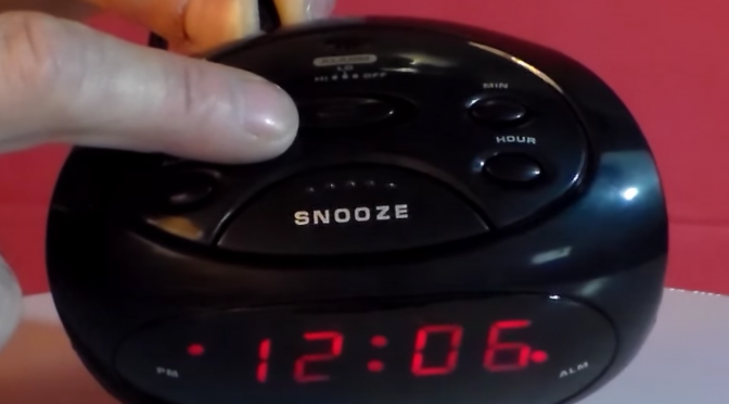 Setting the alarm on a clock radio