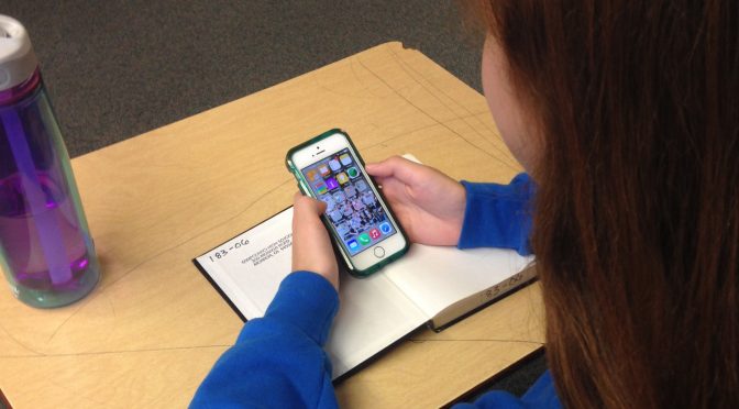 Using mobile device in class - image credit Intel Free Press