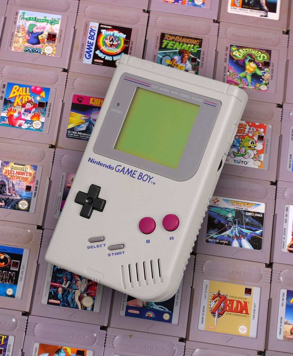 Nintendo Game Boy in front of Assorted Games Cartridges