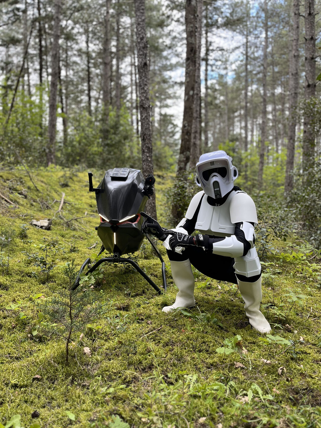 Star Wars Scout Trooper crounching next to the Volonaut Airbike ready for Star Wars Day on May the Forth